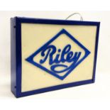 A vintage light up Riley sign. 42x10x31cm