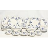 A 41 piece Royal Doulton ‘Expressions’ tea and dinner set. A pair of tureens, 6 dinner plates, 6