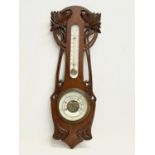 A late Victorian barometer. 58cm