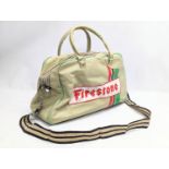 A vintage Firestone bag with shoulder strap. 51x22x32cm