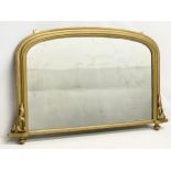 A Victorian gilt framed overmantle mirror. 111x71cm.