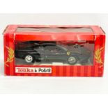 A Tonka Polistil 1984 Ferrari GTO. Box measures 34x15x15cm.