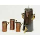 A late 19th/early 20th century copper coffee pot/dispenser and 3 matching copper cups. 14x16x25cm