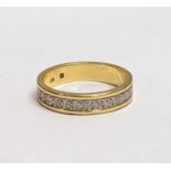 An 18ct gold ring. 3.7g. Size UK J.