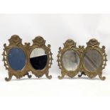 A pair of ornate brass mirrors. 21x19.5cm