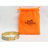 A Hermes bracelet.