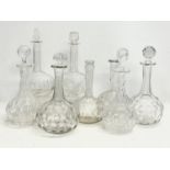 8 vintage crystal decanters.