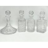 4 crystal decanters.