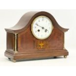 An Edwardian inlaid mahogany mantle clock. With key and pendulum. 30x12x23cm