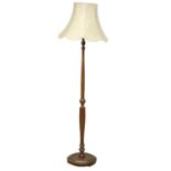 A vintage mahogany standard lamp. 175cm