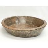 A large late 19th/early 20th century Indian food preparation bowl. 53x54x11cm