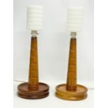 A pair of tall 1950’s oak table lamps with glass shades. 21x56cm