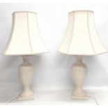 A pair of pottery table lamps.