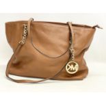 A Michael Kors leather handbag.