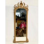 A long Victorian ornate gilt framed mirror. 44x110cm