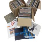 A collection of vintage vinyl LP records, including Sting, Snow Patrol, etc.
