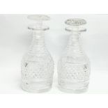 A pair of large good quality early 20th century Georgian style crystal decanters. 25cm
