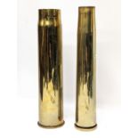 A World War I brass Trench Art shell marked 1917, with World War II brass shell, marked 1942.