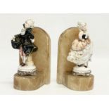 A pair of vintage onyx and pottery bookends. 8.5x15.5cm