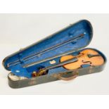 A good quality late 19th/early 20th century violin in case. Case measures 79cm