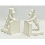 A pair of 1950’s Hummel pottery bookends. 8x11x16cm.