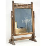 A large early 20th century carved oak tabletop dressing mirror. 56x21x73cm