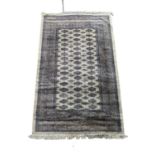 A large good quality vintage Middle Eastern rug.161x251cm