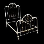 A Victorian cast iron and brass bed. 122x201cm