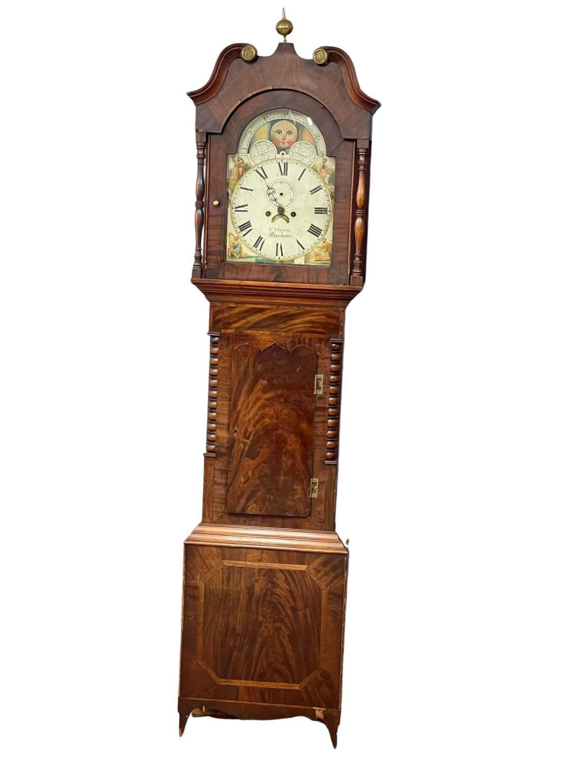 A large early Victorian mahogany long case clock with painted moon dial face. Circa 1835-1840.