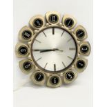 A 1960’s Mid Century sunburst wall clock by Metamec. 34cm