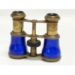 A pair of late 19th century Voigtlander enamel and brass opera glasses.