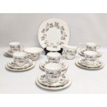 A 21 piece Tuscan 'Dawn Rose' tea set.