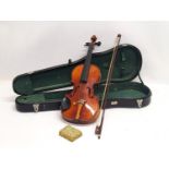 A vintage violin in case.