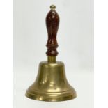 A vintage brass bell. 15x25cm.