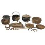 A quantity of 19th century cast iron pots and pans etc.