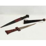 2 West African leather bound tribal knives. 41cm
