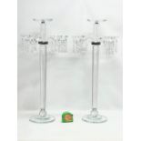 A pair of large ornate glass candelabrums. 33x78.5cm