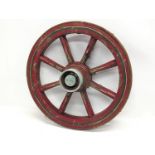 A small vintage cart wheel. 45cm