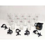 A set of 12 Heineken drinking glasses, a Old Bushmills pottery jug, etc.