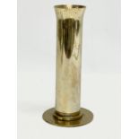 A brass cannon shell. 10x22cm