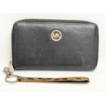 A Michael Kors purse. 19cm.