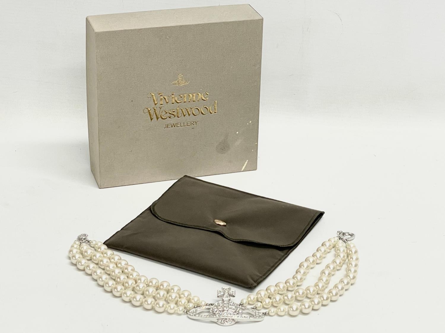 A Vivienne Westwood necklace in box