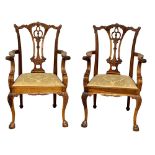 A pair of good quality Chippendale style mahogany armchairs.