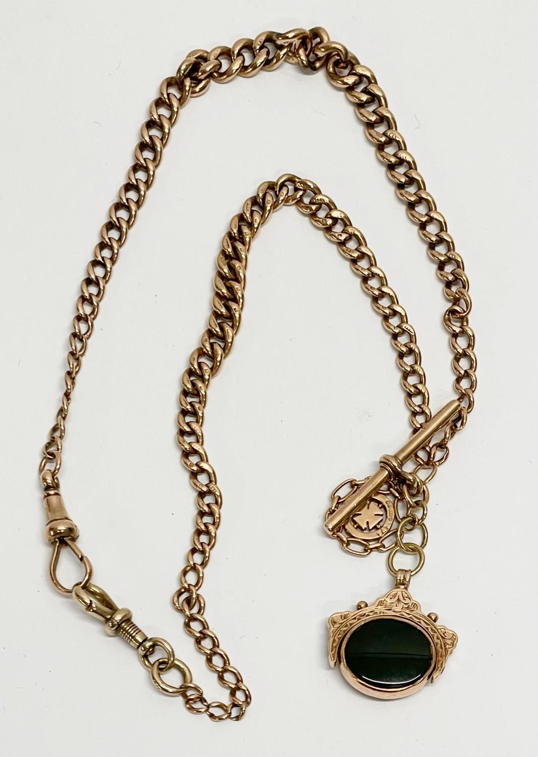 A 9ct gold chain and fob necklace. 33.16 grams