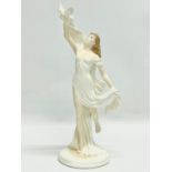 A limited edition Royal Worcester Spirit of Peace porcelain figurine. Maureen Halson. 30cm