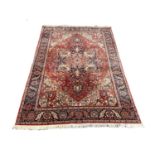A large vintage Middle Eastern style Heriz Kadjar rug. 299x201cm