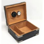 A cigar humidor. 27x23x11.5cm