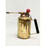 A large vintage brass burner. 27x22cm.
