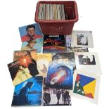 A collection of vintage vinyl LP records including Elton John, Elvis, The Carpenters, Johnny Cash,