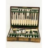A vintage canteen of silver plated and steel cutlery. 39x30x8cm